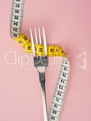 Measuring tape with a steel fork