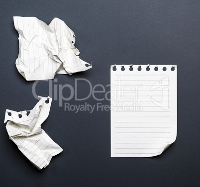 white sheets of a diary with a curved corner