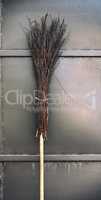 old broom on a wooden handle