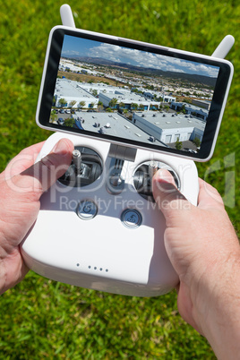 Hands Holding Drone Quadcopter Controller With Indutrial Buildin