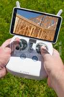 Hands Holding Drone Quadcopter Controller With Construction Hous