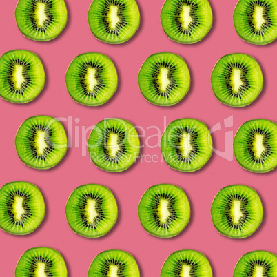 Kiwi fruit slices pattern on vibrant color background