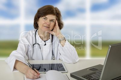 Female doctor at the desk