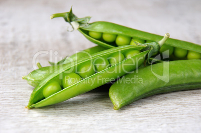 Pods of fresh green peas