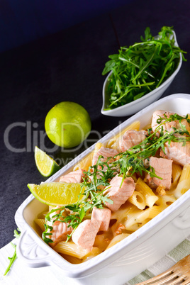 Salmon with penne noodle and arugula