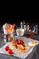 vegetable French fries with herb quark and tomatoes