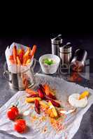 vegetable French fries with herb quark and tomatoes