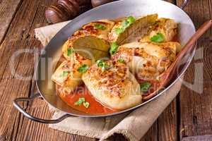 baked cabbage rolls in tomato sauce