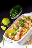 Salmon with penne noodle and arugula