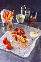 vegetable French fries with herb quark and tomatoes