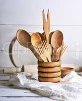 wooden spoons and forks in a wooden container
