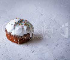 Easter baking with white sugar glaze and colorful decor balls