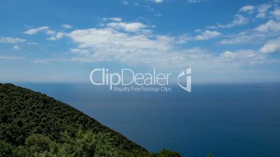 Time-lapse of clouds and yachts on the ocean in Italy, Tuscany, Piombino