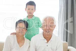 Asian grandparents and grandson