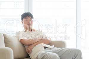 Asian mature man at home