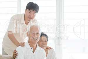 Asian mature son and old parents at home