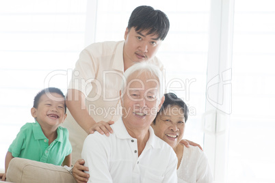 Asian family portrait at home