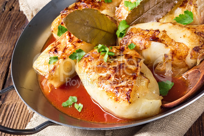 baked cabbage rolls in tomato sauce