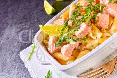 Salmon with penne noodle and arugula