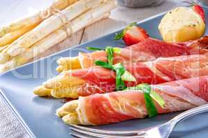 asparagus ham rolls with strawberries and hollandaise