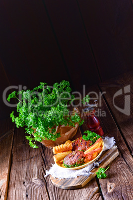 grilled bullets with croquettes and vegetables