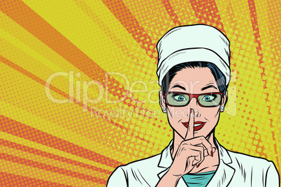 nurse asks for silence, gesture finger to lips