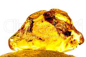 Amber in sun with inclusions