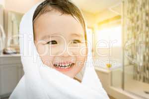 Happy Cute Mixed Race Chinese and Caucasian Boy In Bathroom Wrap