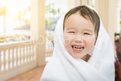 Happy Cute Mixed Race Chinese and Caucasian Boy On Tropical Pati