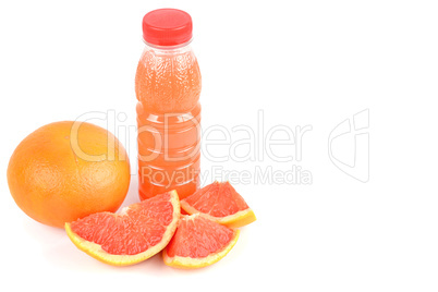 A fruit of grapefruit and a bottle with juice isolated on white