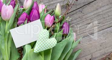 bouquet of pink and violet tulips