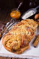 braided yeast bun  with egg and butter