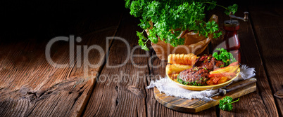 grilled bullets with croquettes and vegetables