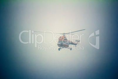 helicopter in fog at sea.
