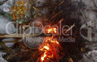 picnic in winter on nature of a bonfire