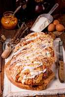 braided yeast bun  with egg and butter