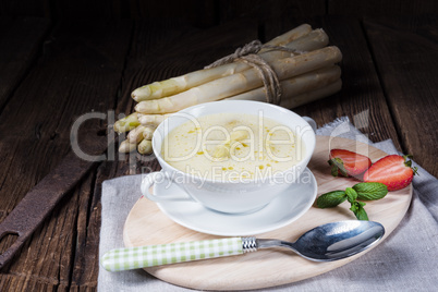 rustic white asparagus cream soup with butter