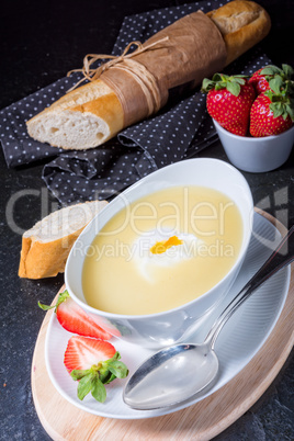 asparagus soup with poached egg and fresh baguettes