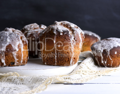 baked Easter cake with white lemon glaze wooden board