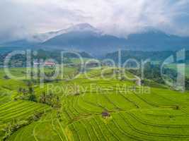 Terraces of Rice Fields and Mountains in the Clouds. Aerial View