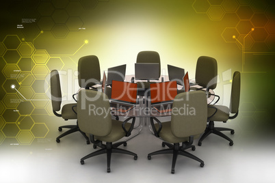 Conference table with laptops in color background