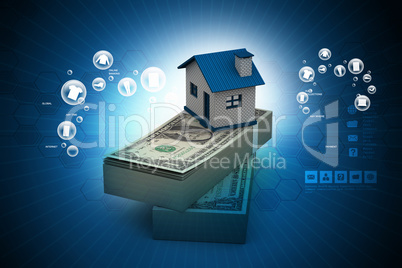 Home placed on the tope of dollar notes in color background