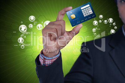 Business man showing credit card in color background