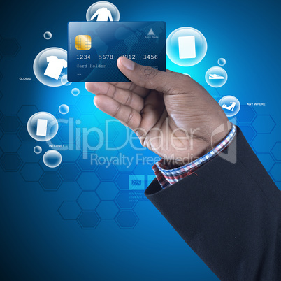 Business man showing credit card in color background