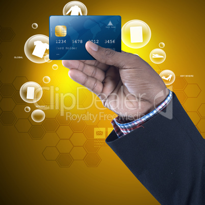 Business man showing credit card in color background