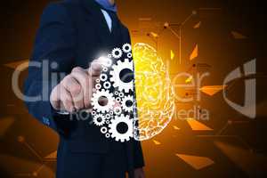 Man showing brain and gear wheels in color back ground