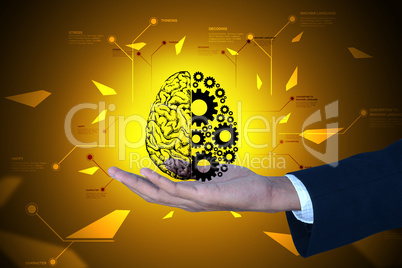 Man showing brain and gear wheels in color back ground