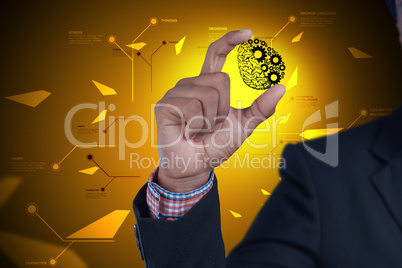 Man showing brain and gear wheels in color back ground