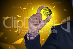 Man showing brain and gear wheels in color back ground