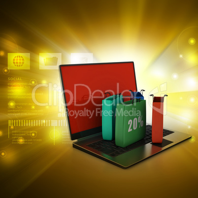 Online shopping concept with laptop computer in color background
